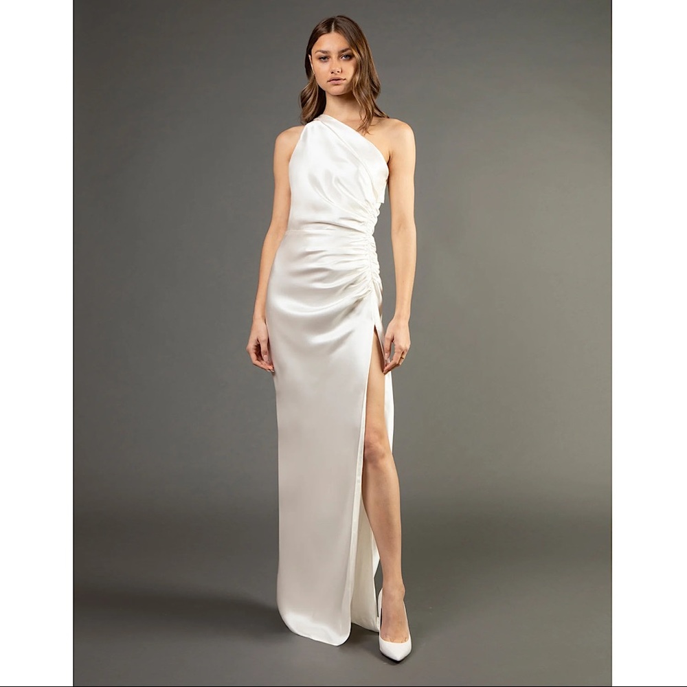 Asymmetrical one shoulder neckline gown in 100% silk.